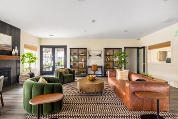 Clubroom/wifi lounge with social seating, kitchenette, complimentary coffee bar & flatscreen tv,
